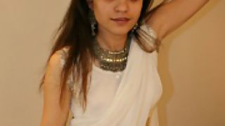 jasmine in white Indian saree looking hot teasing her man