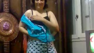 Chubby Indian wife stripping naked and showing her big boobs