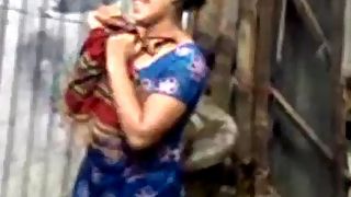Indian village bhabhi taking open shower and drying herself off